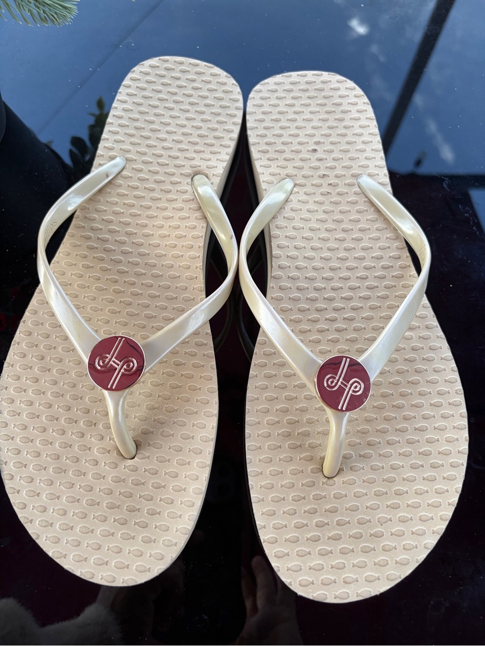lindsay phillips Cream Flip Flops with Maroon Logo Medallion